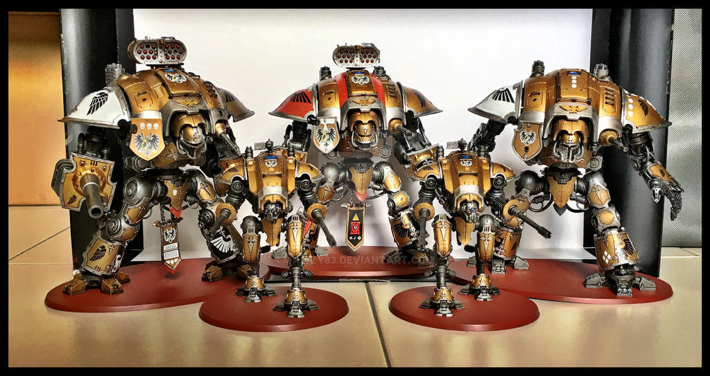 Imperial Knight army with heavy and lighter troops. Gold plated with red accenting on some.