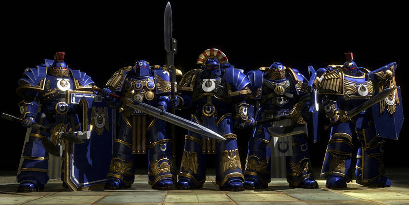 Ultramarines Honour Guard in ornate blue and gold armor, armed with swords and shields.